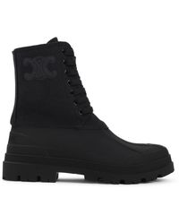 Celine - Schwarzer Canvas Triomphe Stiefel - Lyst