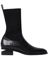 Alexander Wang - Schwarzer Strickstiefelette Niedriger Absatz - Lyst