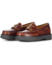 Tod's - Glänzende Lederslipper Mit Goldenem Logo - Lyst