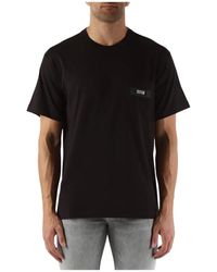 Versace - Regular fit baumwoll-t-shirt mit fronttasche - Lyst