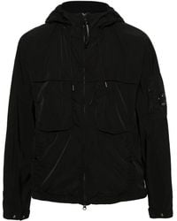 C.P. Company - Schwarze jacke mit verstellbarer kapuze und linsendetail - Lyst