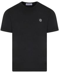 Stone Island - Schwarzes baumwoll-t-shirt mit logo-label - Lyst