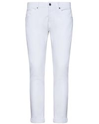 Dondup - Weiße skinny-fit jeans mit logo-plakette - Lyst