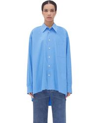 Bottega Veneta - Camisa oversize azul con etiqueta especial y cierre de botón - Lyst