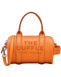 Marc Jacobs - Tangerine leder mini duffle tasche - Lyst