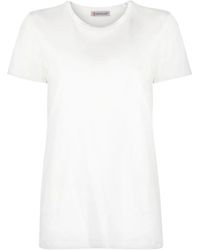 Moncler - Magliette in cotone bianca con patch logo - Lyst