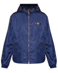 Versace - Jassen ,Blauw ,Blauwe Hoodie Met Logopatch - Lyst