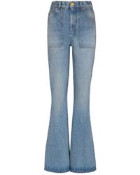 Balmain - Jeans ,Blauw ,Denim Hoge Taille Uitlopende Denim Jeans - Lyst