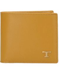 Tod's - Dunkelgelbe lederbrieftasche - Lyst