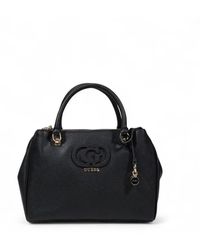 Guess - Handbags - Lyst