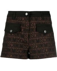 Moschino - Shorts marroni con logo jacquard - Lyst