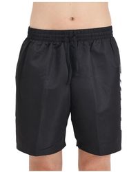 Nike - Nero beachwear shorts mare big block - Lyst