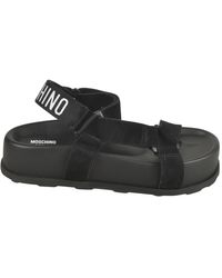 Moschino - Flat Sandals - Lyst
