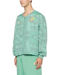 PUMA - King Logo Relaxed Track Jacket - Lyst