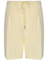 Calvin Klein - Gelbe twill-shorts mit falten-detail - Lyst
