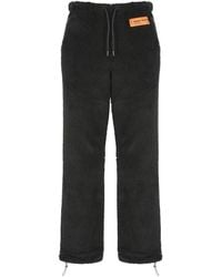 Heron Preston - Schwarze bouclé-hose mit logo-patch - Lyst