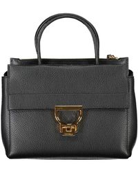 Coccinelle - Schwarze handtasche mit griffen und verstellbarem riemen - Lyst