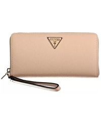 Guess - Rosa geldbörse mit reißverschluss und mehreren fächern - Lyst