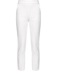 Pinko - Pantalones slim-fit de crepé elástico técnico - Lyst