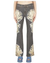 Guess - Flared Jeans Met Bloemenprint - Lyst