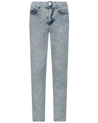 Guess - Blaue skinny jeans mit metall-logo - Lyst