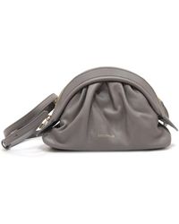 Coccinelle - Mini Cheek Clutch Tasche Mit Riemen - Lyst