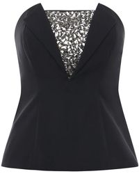 Genny - Sleeveless Tops - Lyst