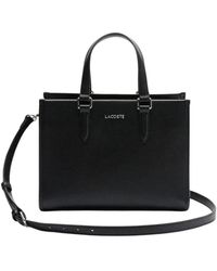 Lacoste - Handbags - Lyst