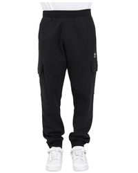 adidas Originals - Pantaloni cargo neri con chiusura a zip e bottone - Lyst