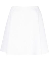 Genny - Short skirts - Lyst