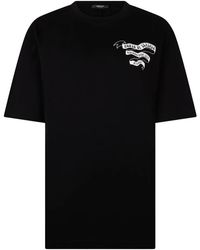 Versace - Tops ,Zwart ,Katoen Geborduurde Katoenen Jersey T-Shirt - Lyst