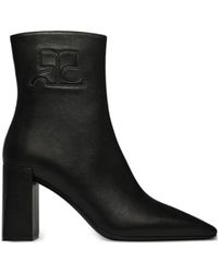 Courreges - Schoenen ,Zwart ,Leer Zwarte Heritage Laarzen Met Logo Rits - Lyst