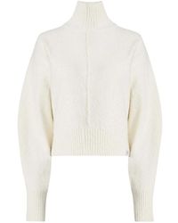 Calvin Klein - Pullover avorio con elegante collo alto e maniche ampie - Lyst