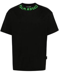 Palm Angels - Schwarze t-shirts und polos mit logo-print - Lyst