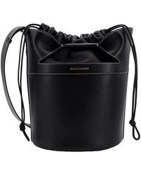 Alexander McQueen - Schwarze bucket bag rucksack mit lederzugband - Lyst