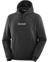 Salomon - Schwarzer logo pullover hoody - Lyst