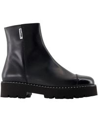 CAREL PARIS - Zwarte Leren Enkellaarzen Met Details - Lyst
