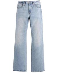 Levi's - Flared Jeans - Lyst