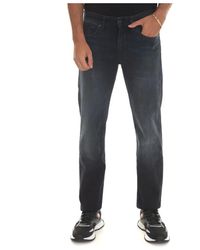 BOSS - Slim fit stone washed denim jeans - Lyst
