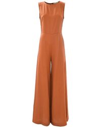 Kocca - Lyocell Jumpsuit Met Wijde Pijpen En Ronde Hals - Lyst