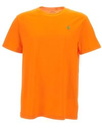 Polo Ralph Lauren - T-shirt e polo con logo ricamato in arancione - Lyst