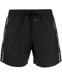 Emporio Armani - Swimwear boxer mare nero con banda logata laterale - Lyst