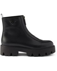Prada - Schoenen ,Zwart ,Leer Leren Rits Enkellaarsjes - Lyst