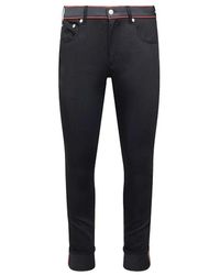 Alexander McQueen - Logo denim skinny jeans - Lyst