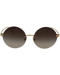 Dolce & Gabbana Gouden Montuur Grijze Lens Ronde Montuurloze Zonnebril - Bruin
