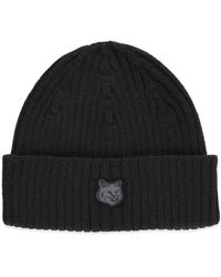 Maison Kitsuné - Berretto in lana nera a coste con logo fox head - Lyst