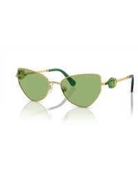 Swarovski - Gold/grüne sonnenbrille - Lyst