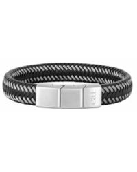 Caï - Zwart Gevlochten Leren Armband Met Roestvrijstalen Sluiting - Lyst