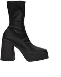 Stella McCartney - Schwarze Leder-Stiefeletten Pin Up Stil - Lyst