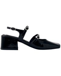 Alohas - Zapatos de tacón de cuero negro - Lyst